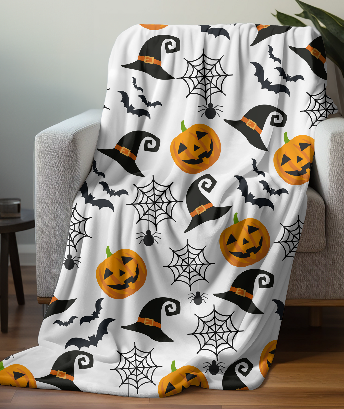 Haunted Halloween Throw Blanket: Spider Webs Witch's Hat Black Bats and Pumpkin Designs