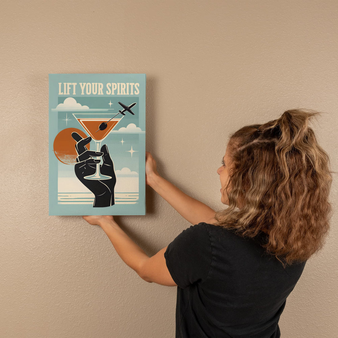 “Lift Your Spirits" Gallery Wrapped Canvas.” Perfect for adding a splash of sass and sophistication to any bar area, kitchen, or travel-lover's nook.