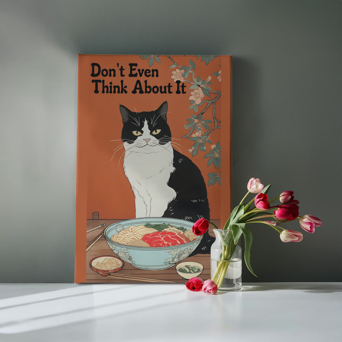 “Don't Even Think About It,” this canvas brings humor and personality no-nonsense tuxedo cat guarding its ramen bowl.