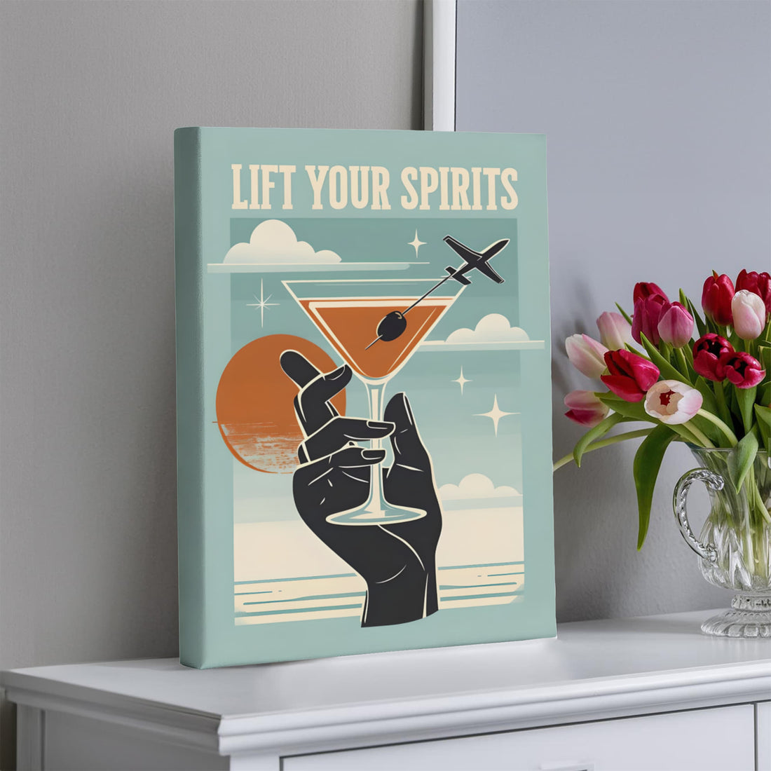 “Lift Your Spirits" Gallery Wrapped Canvas.” Perfect for adding a splash of sass and sophistication to any bar area, kitchen, or travel-lover's nook.