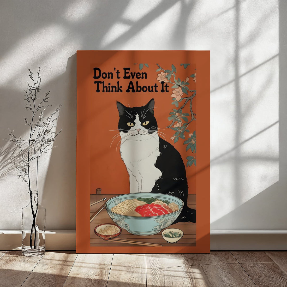 “Don't Even Think About It,” this canvas brings humor and personality no-nonsense tuxedo cat guarding its ramen bowl.